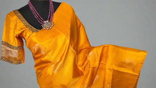 Yellow soft silk saree  zari and hand embroidered blouse with Tissue sleeves