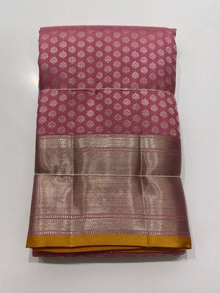 Pastel Brocade kanjivaram silver zari with stitched blouse.