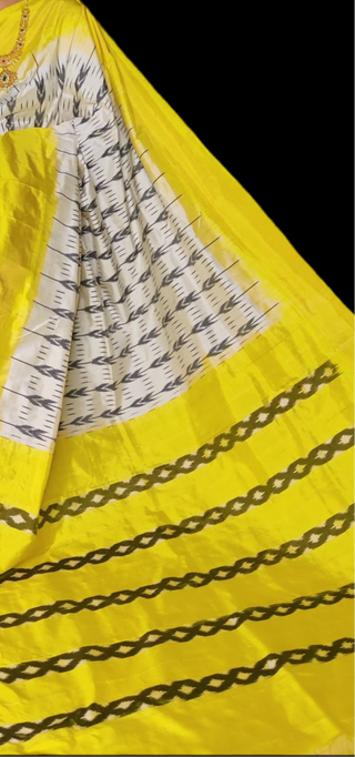 White yellow pure ikat silk saree with prestitched blouse pett border