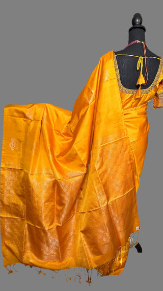 Yellow soft silk saree  zari and hand embroidered blouse with Tissue sleeves