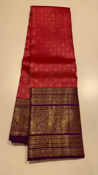 Pinkish Red Brocade kanjivaram silver zari with stitched blouse